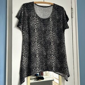 Nice long animal print tee. This was a gift, brand new, never worn.